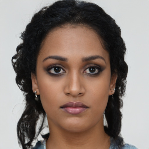 Neutral black young-adult female with long  black hair and brown eyes