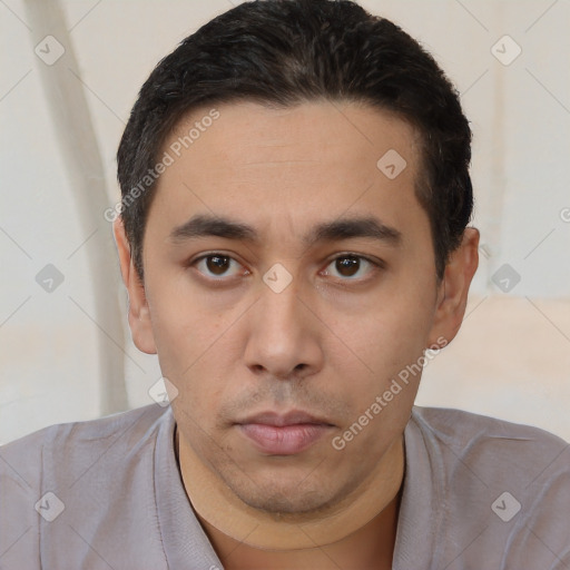 Neutral white young-adult male with short  black hair and brown eyes