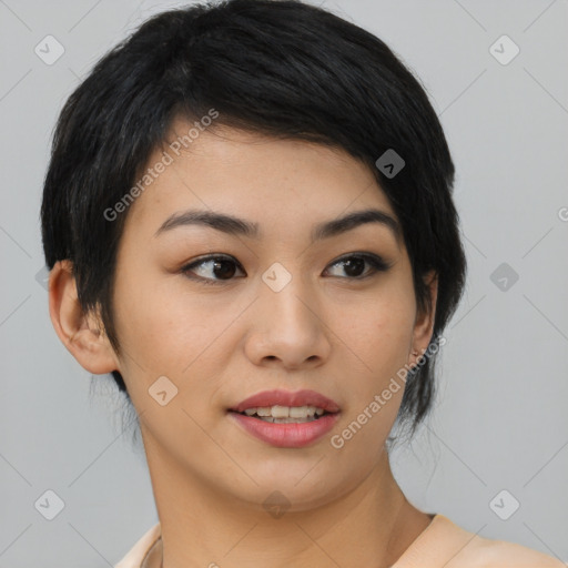 Joyful asian young-adult female with medium  black hair and brown eyes