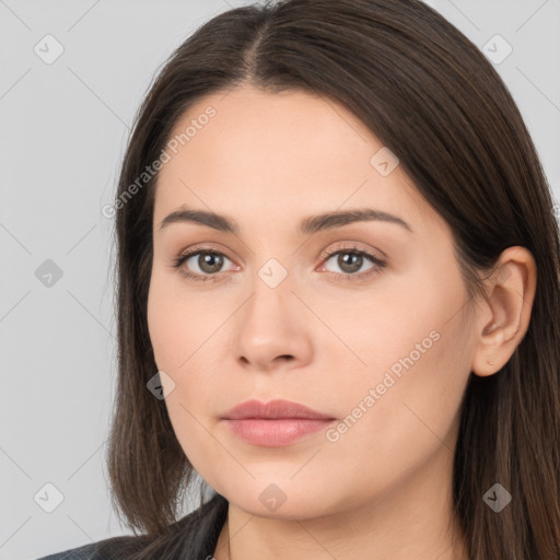 Neutral white young-adult female with long  brown hair and brown eyes