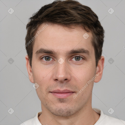 Neutral white young-adult male with short  brown hair and brown eyes