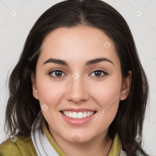 Joyful white young-adult female with medium  brown hair and brown eyes