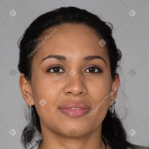 Joyful latino young-adult female with medium  brown hair and brown eyes