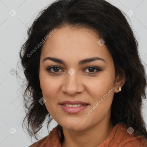 Joyful latino young-adult female with long  brown hair and brown eyes