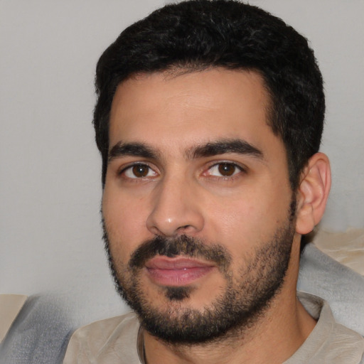 Neutral white young-adult male with short  black hair and brown eyes