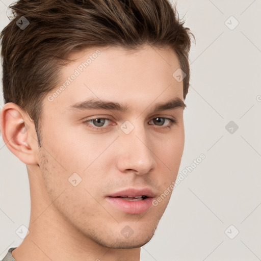 Neutral white young-adult male with short  brown hair and brown eyes