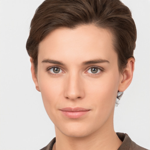 Neutral white young-adult female with short  brown hair and brown eyes