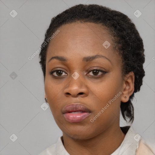 Neutral black young-adult female with short  brown hair and brown eyes