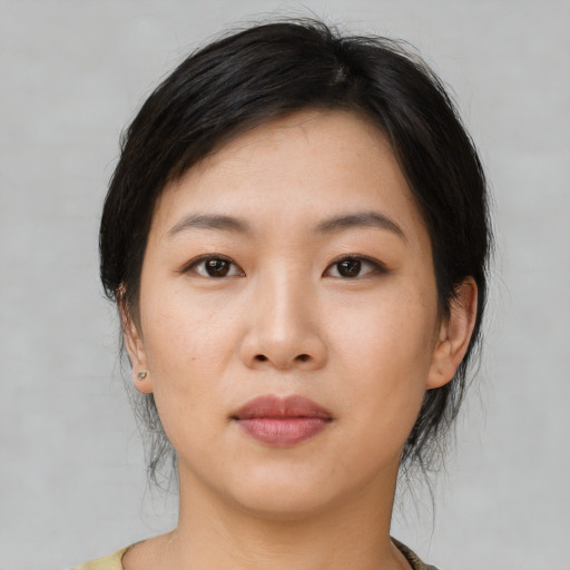 Neutral asian young-adult female with short  black hair and brown eyes