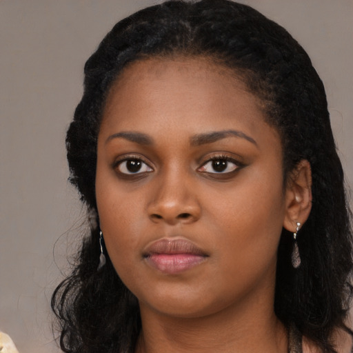 Neutral black young-adult female with long  black hair and brown eyes