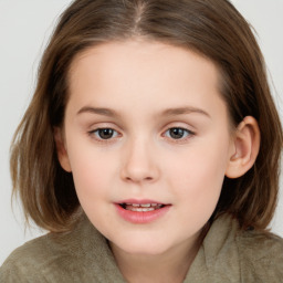 Joyful white child female with medium  brown hair and brown eyes