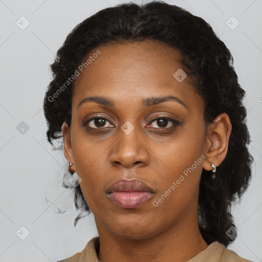 Neutral black adult female with short  brown hair and brown eyes