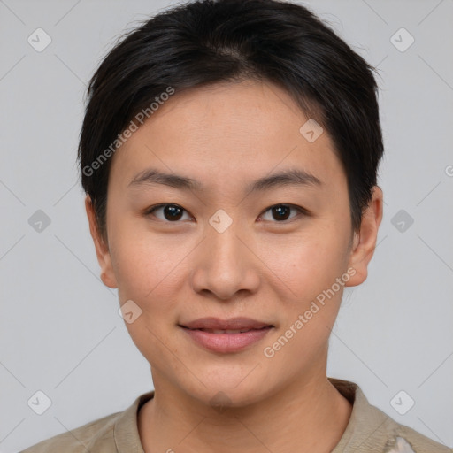 Joyful asian young-adult female with short  brown hair and brown eyes