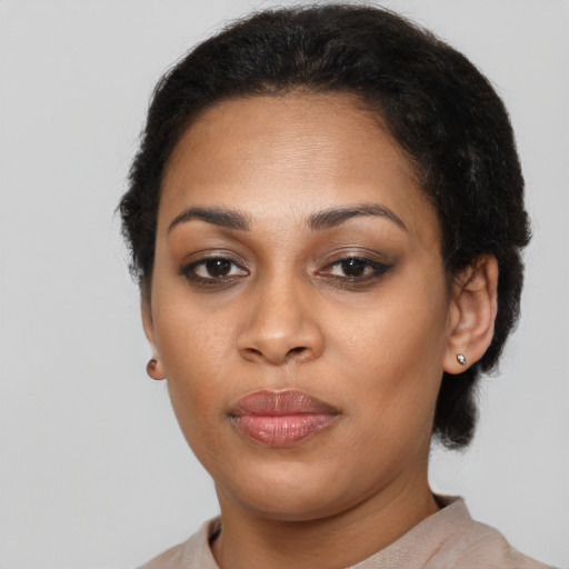 Neutral latino young-adult female with short  black hair and brown eyes