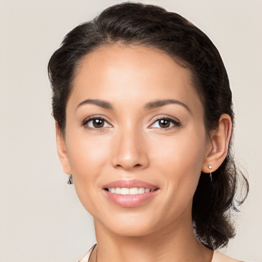 Joyful white young-adult female with medium  brown hair and brown eyes