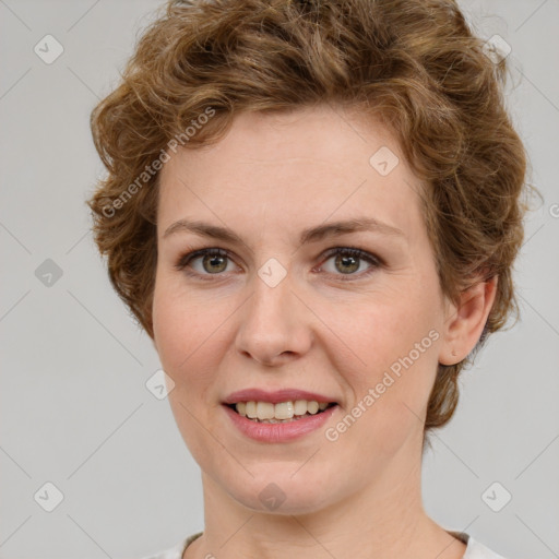 Joyful white young-adult female with medium  brown hair and green eyes