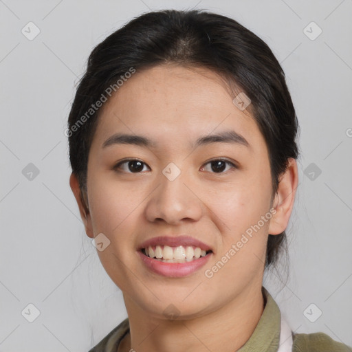 Joyful asian young-adult female with short  brown hair and brown eyes