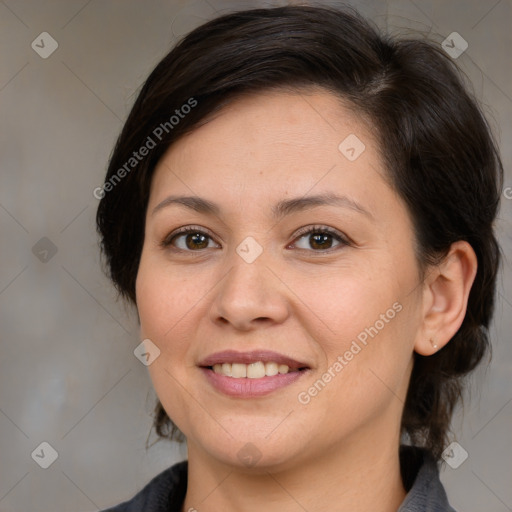 Joyful white adult female with medium  brown hair and brown eyes