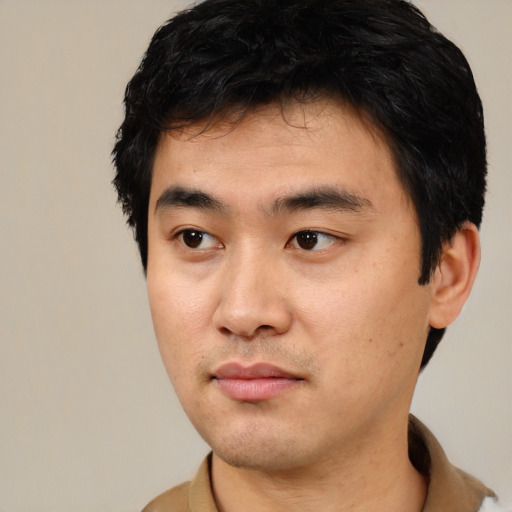 Neutral asian young-adult male with short  black hair and brown eyes