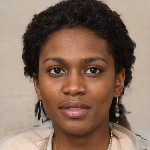 Neutral black young-adult female with short  black hair and brown eyes