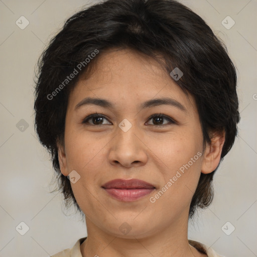 Joyful asian adult female with medium  brown hair and brown eyes