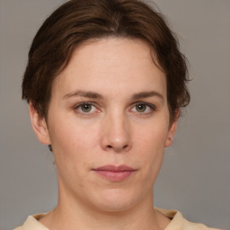 Neutral white young-adult female with short  brown hair and brown eyes