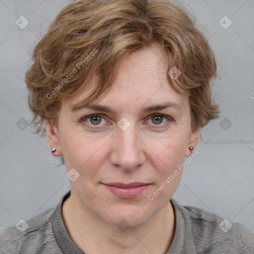 Joyful white adult female with medium  brown hair and blue eyes