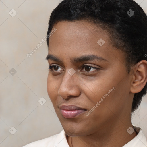 Neutral black young-adult female with short  black hair and brown eyes