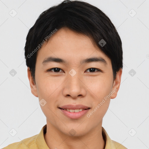 Joyful asian young-adult male with short  black hair and brown eyes