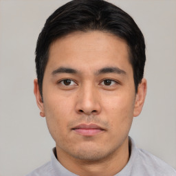 Neutral asian young-adult male with short  black hair and brown eyes