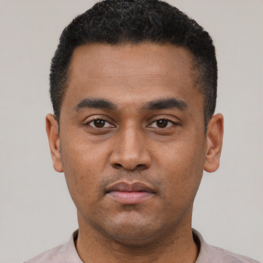 Neutral latino young-adult male with short  black hair and brown eyes