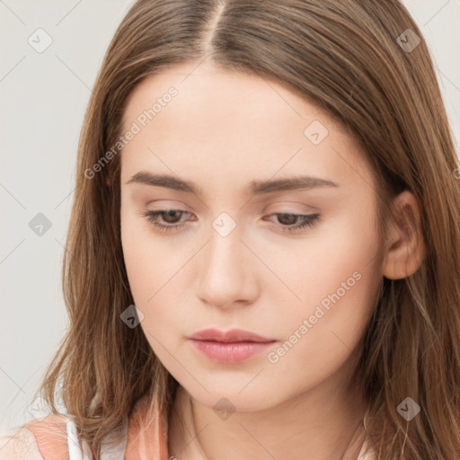 Neutral white young-adult female with long  brown hair and brown eyes