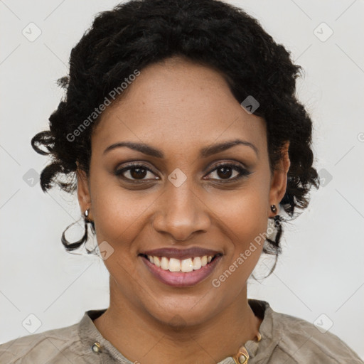 Joyful black young-adult female with short  brown hair and brown eyes