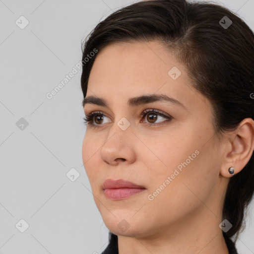 Neutral white young-adult female with medium  brown hair and brown eyes