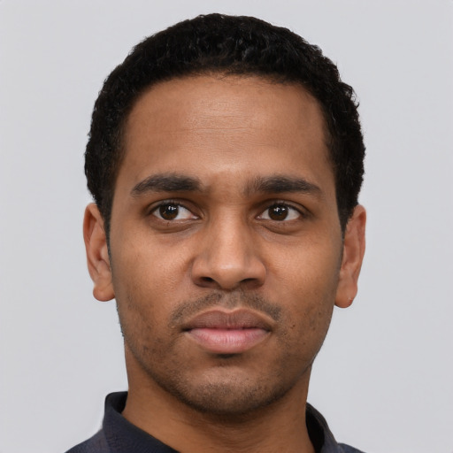 Neutral black young-adult male with short  black hair and brown eyes