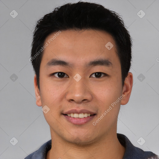 Joyful white young-adult male with short  black hair and brown eyes