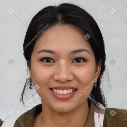 Joyful asian young-adult female with medium  black hair and brown eyes