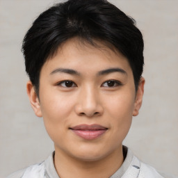 Joyful asian young-adult female with short  brown hair and brown eyes