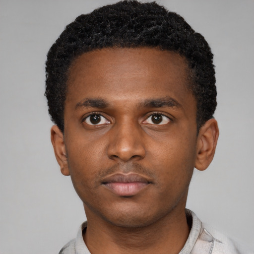 Neutral latino young-adult male with short  brown hair and brown eyes