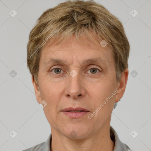 Joyful white adult male with short  brown hair and grey eyes