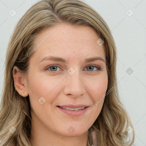 Joyful white young-adult female with long  brown hair and blue eyes