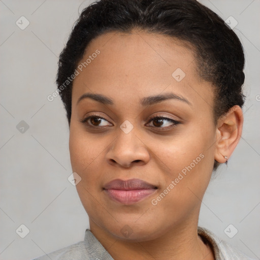 Joyful black young-adult female with short  brown hair and brown eyes