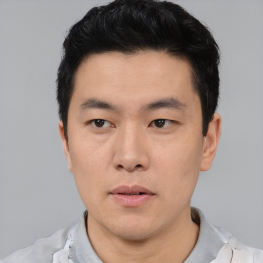 Neutral asian young-adult male with short  black hair and brown eyes