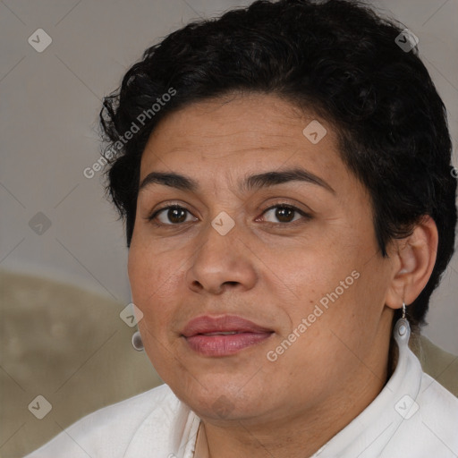 Joyful latino adult female with short  brown hair and brown eyes