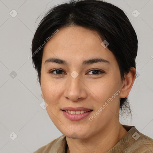 Joyful latino young-adult female with medium  brown hair and brown eyes