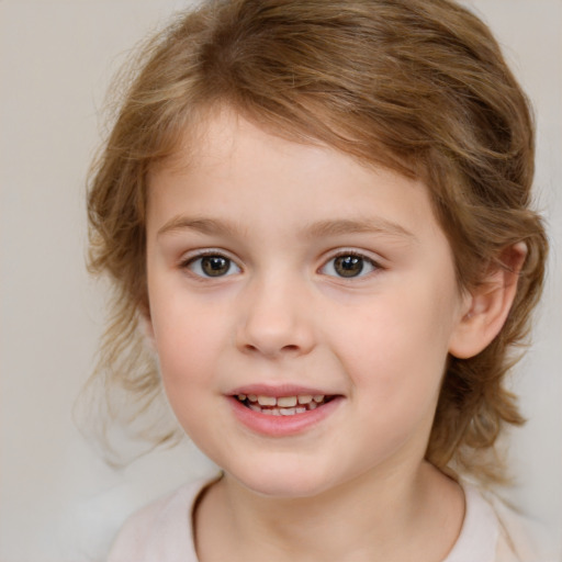 Joyful white child female with medium  brown hair and brown eyes