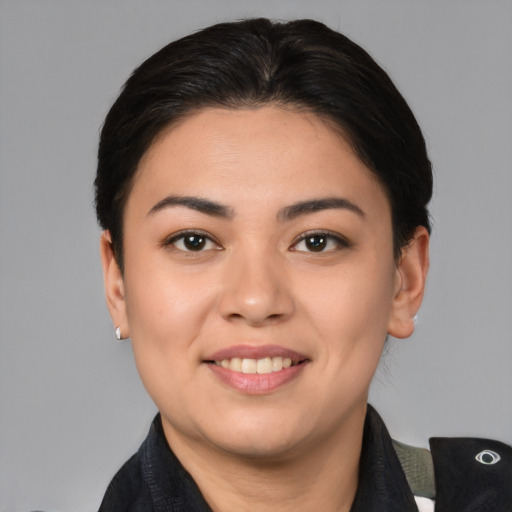 Joyful asian young-adult female with medium  brown hair and brown eyes