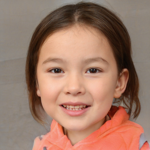 Joyful white child female with medium  brown hair and brown eyes