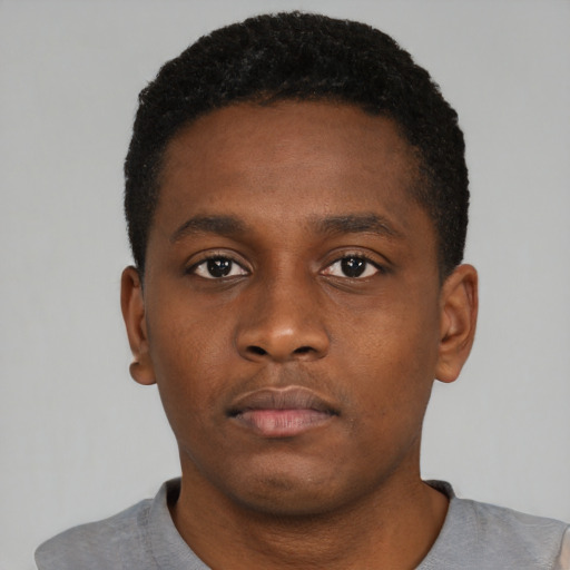 Neutral black young-adult male with short  brown hair and brown eyes