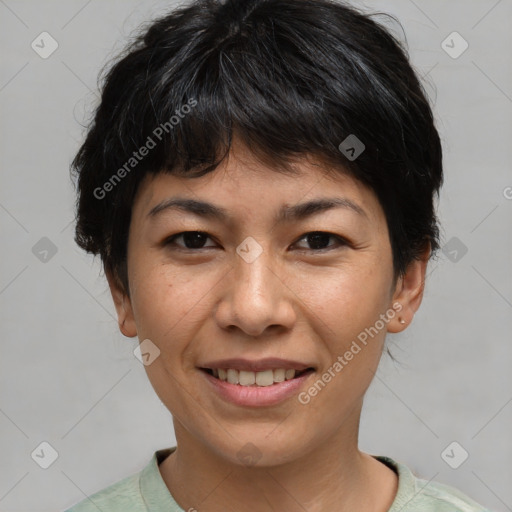 Joyful asian young-adult female with short  brown hair and brown eyes